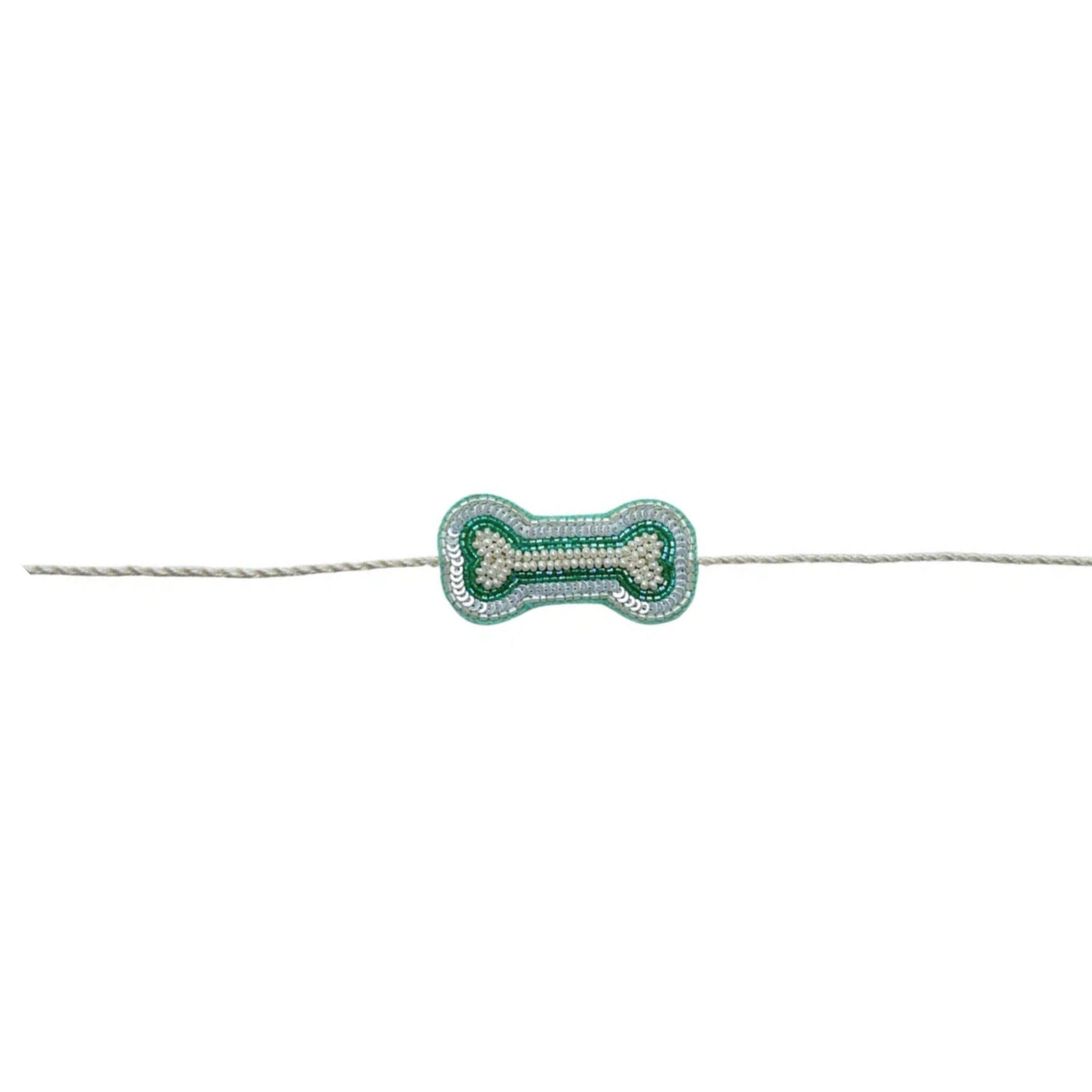 OFF-WHITE ZARI WORK DOG KURTA + AQUA GREEN PEARL BONE RAKHI FOR DOGS AND CATS