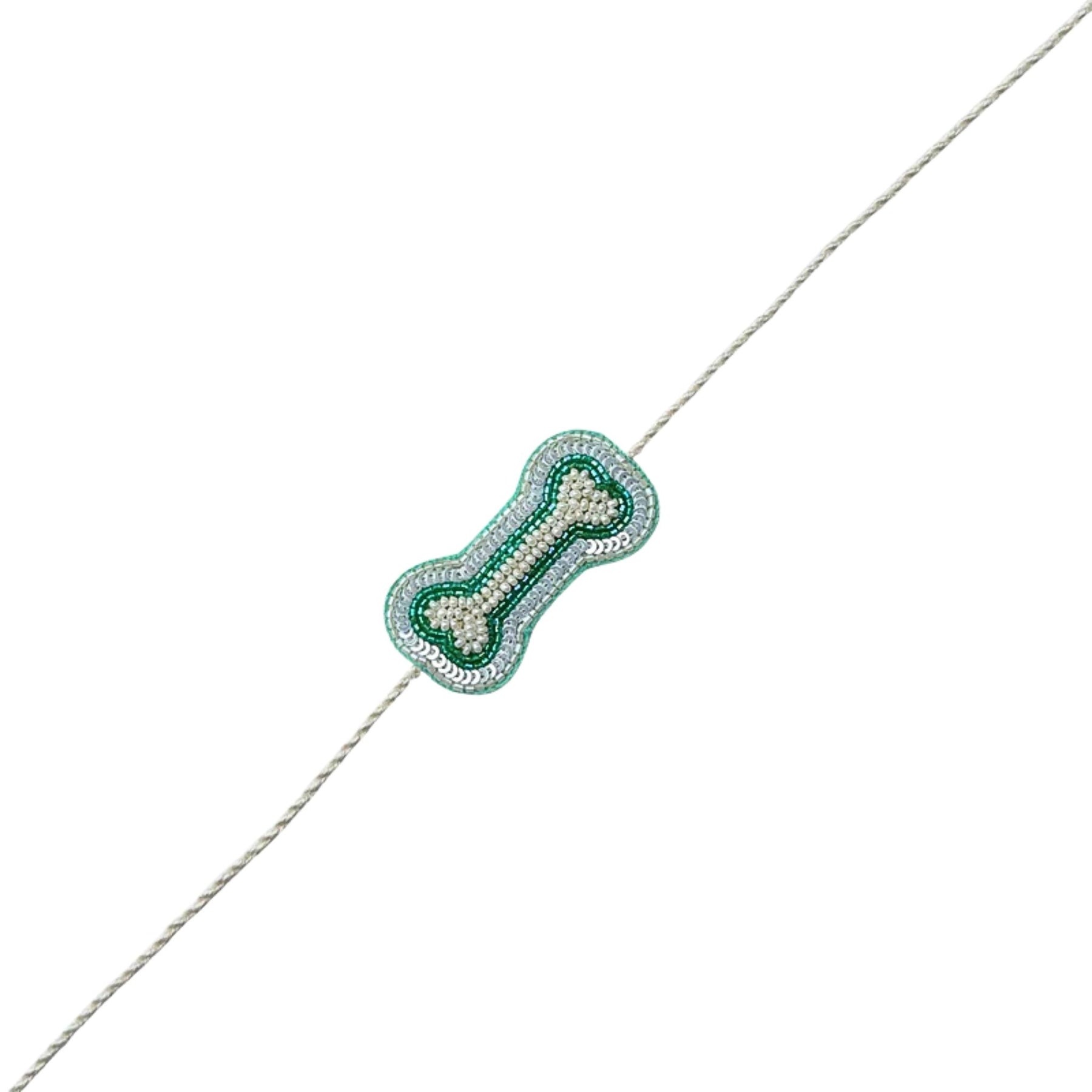 PASTEL BLUE GOLD DOG LEHENGA + AQUA GREEN PEARL BONE RAKHI FOR DOGS AND CATS