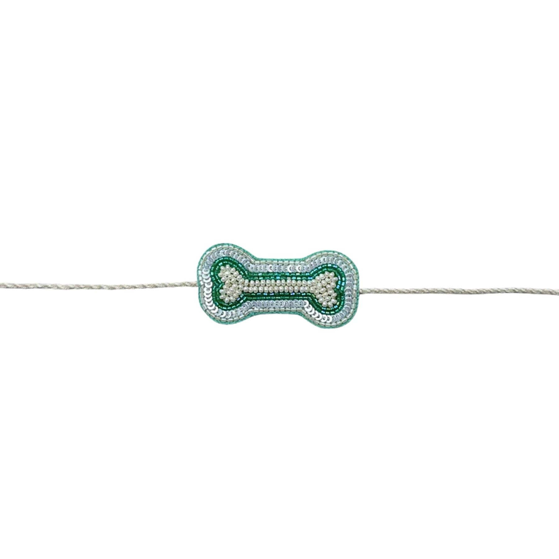PASTEL BLUE GOLD DOG LEHENGA + AQUA GREEN PEARL BONE RAKHI FOR DOGS AND CATS