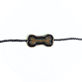 BLACK GOLD BROCADE LEHENGA + NAVY BLUE BONE RAKHI FOR DOGS AND CATS