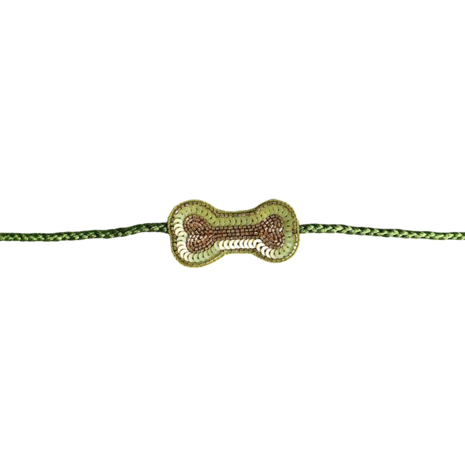 MEHENDI GREEN BANDHANI PRINT HALTER NECK LEHENGA + LIGHT GREEN BONE RAKHI FOR DOGS AND CATS