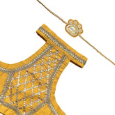 MUSTARD YELLOW LACE DETAILED HALTER NECK LEHENGA + YELLOW PAW-SOME RAKHI FOR DOGS AND CATS