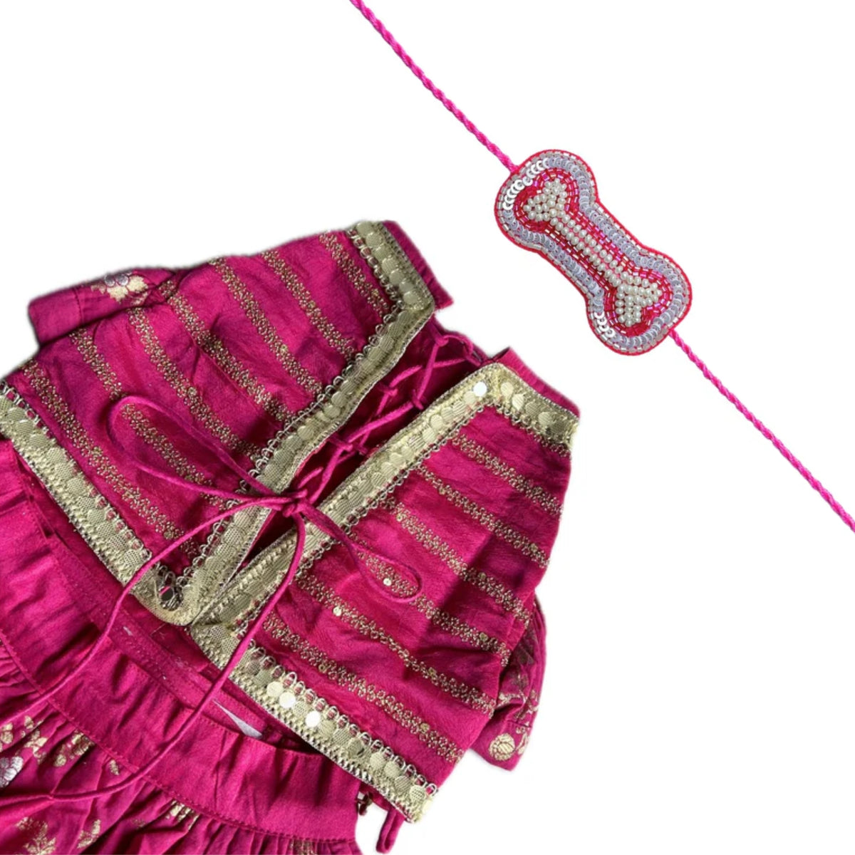 MAGENTA PINK BROCADE MIRROR WORK DOG LEHENGA + SILVER PINK PEARL BONE RAKHI FOR DOGS AND CATS
