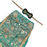 TEAL BLUE TISSUE FLORAL SEQUINS LEHENGA + EMERALD GREEN BONE RAKHI FOR DOGS AND CATS